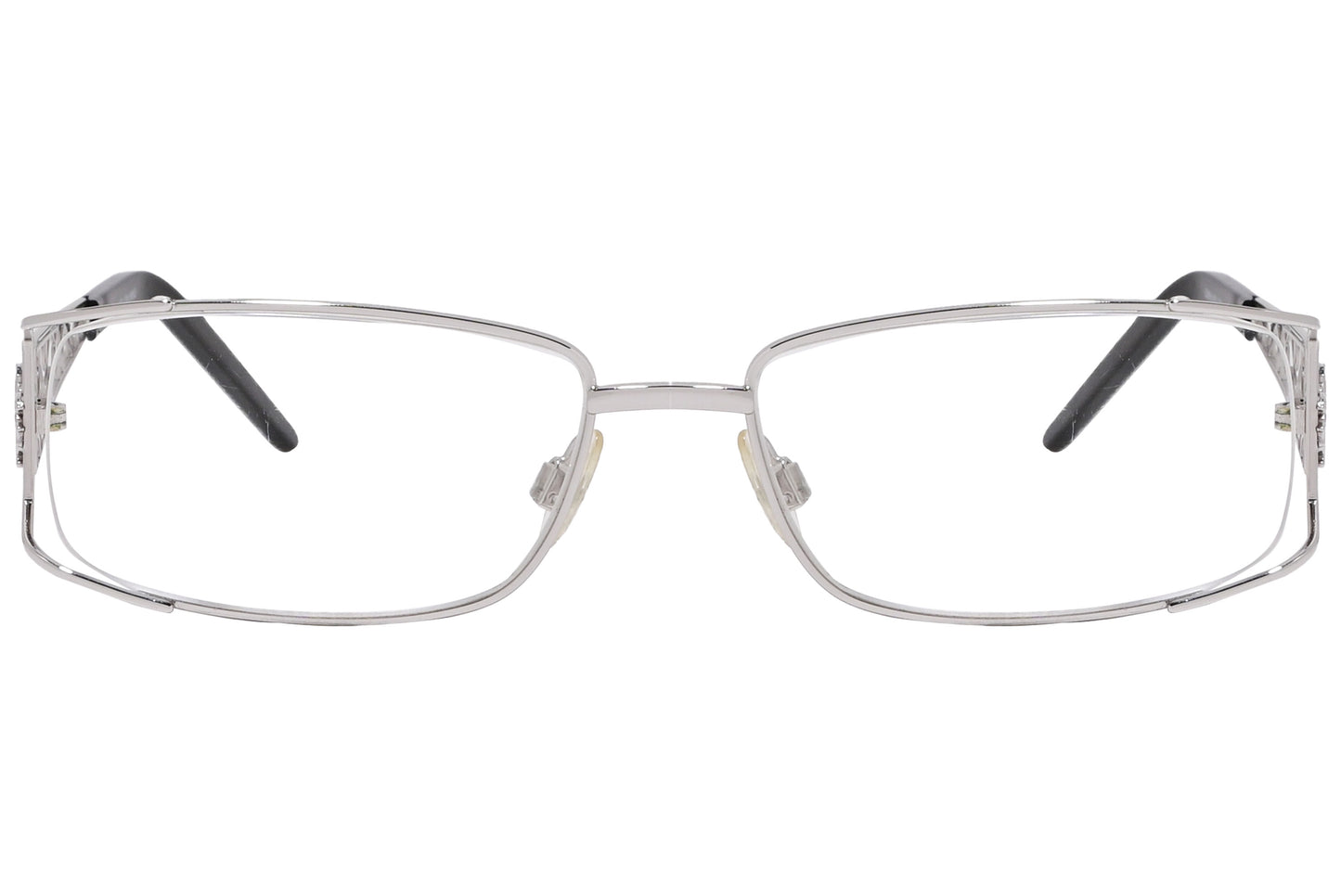 Close-up of silver wrap around eyeglasses highlighting the sleek frame and lens curve.