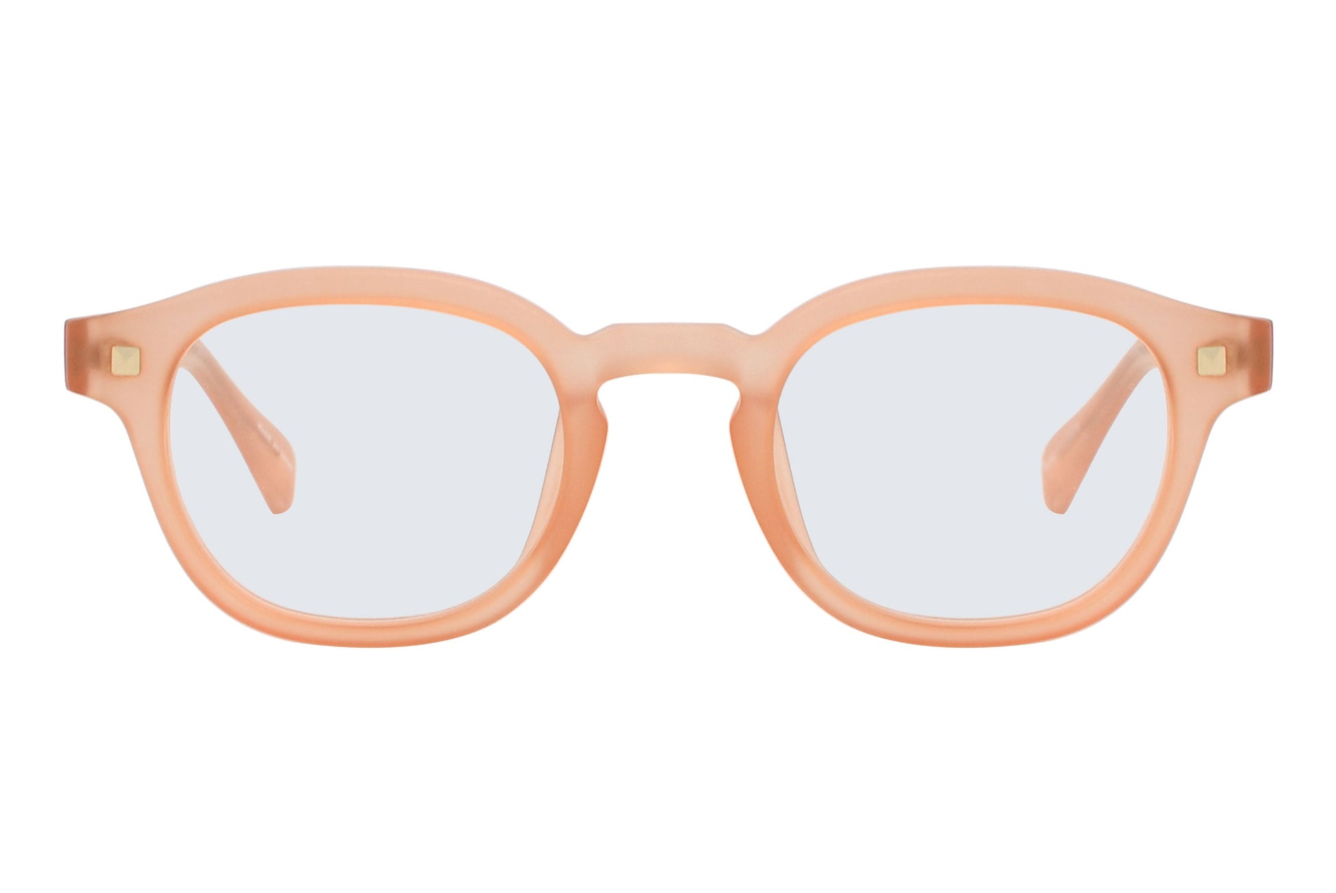 Pair of peach-colored eyeglasses on a white background