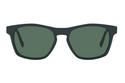 Black sunglasses with green lenses on a white background