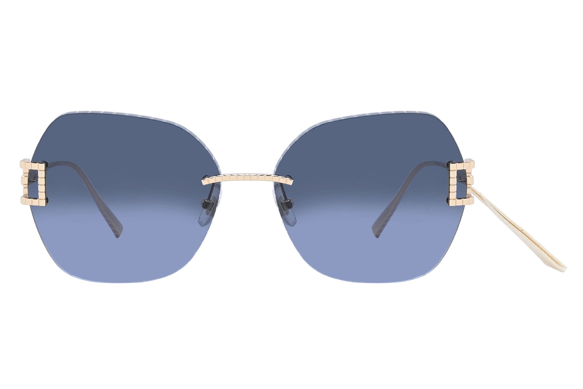 Sunglasses with blue gradient lenses and gold frames on a white background