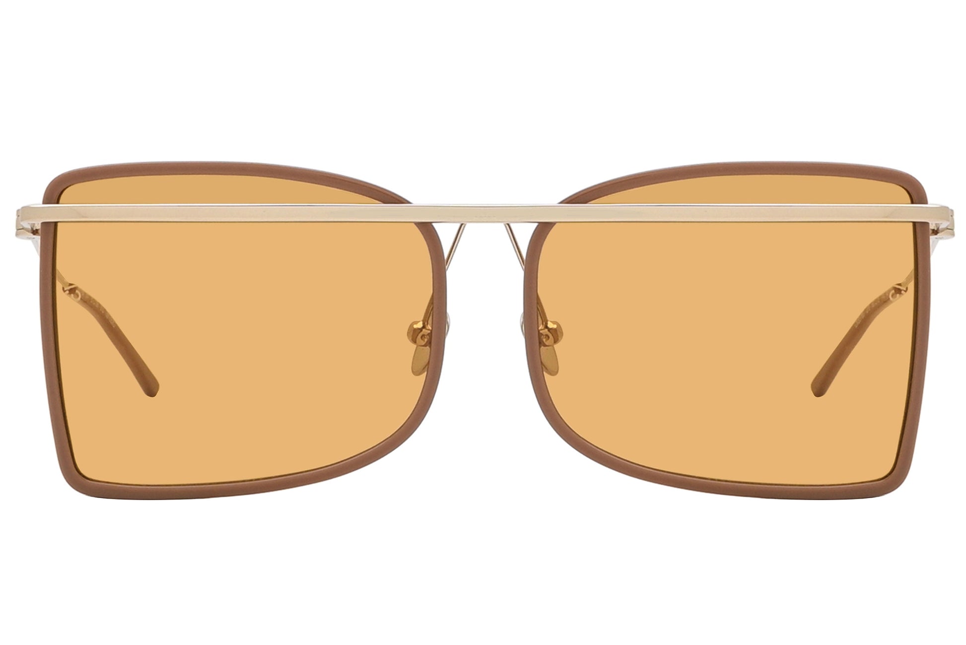 Sunglasses with gold frame and amber lenses on a white background