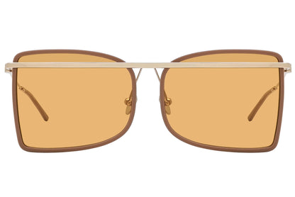 Sunglasses with gold frame and amber lenses on a white background