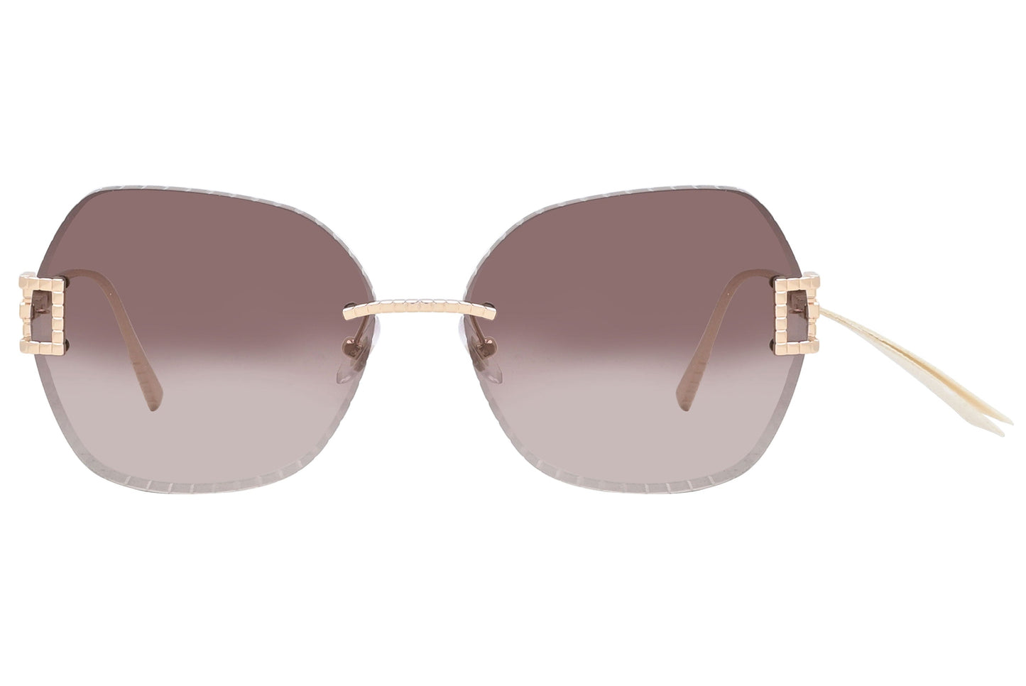 Sunglasses with gradient lenses and gold frames on a white background