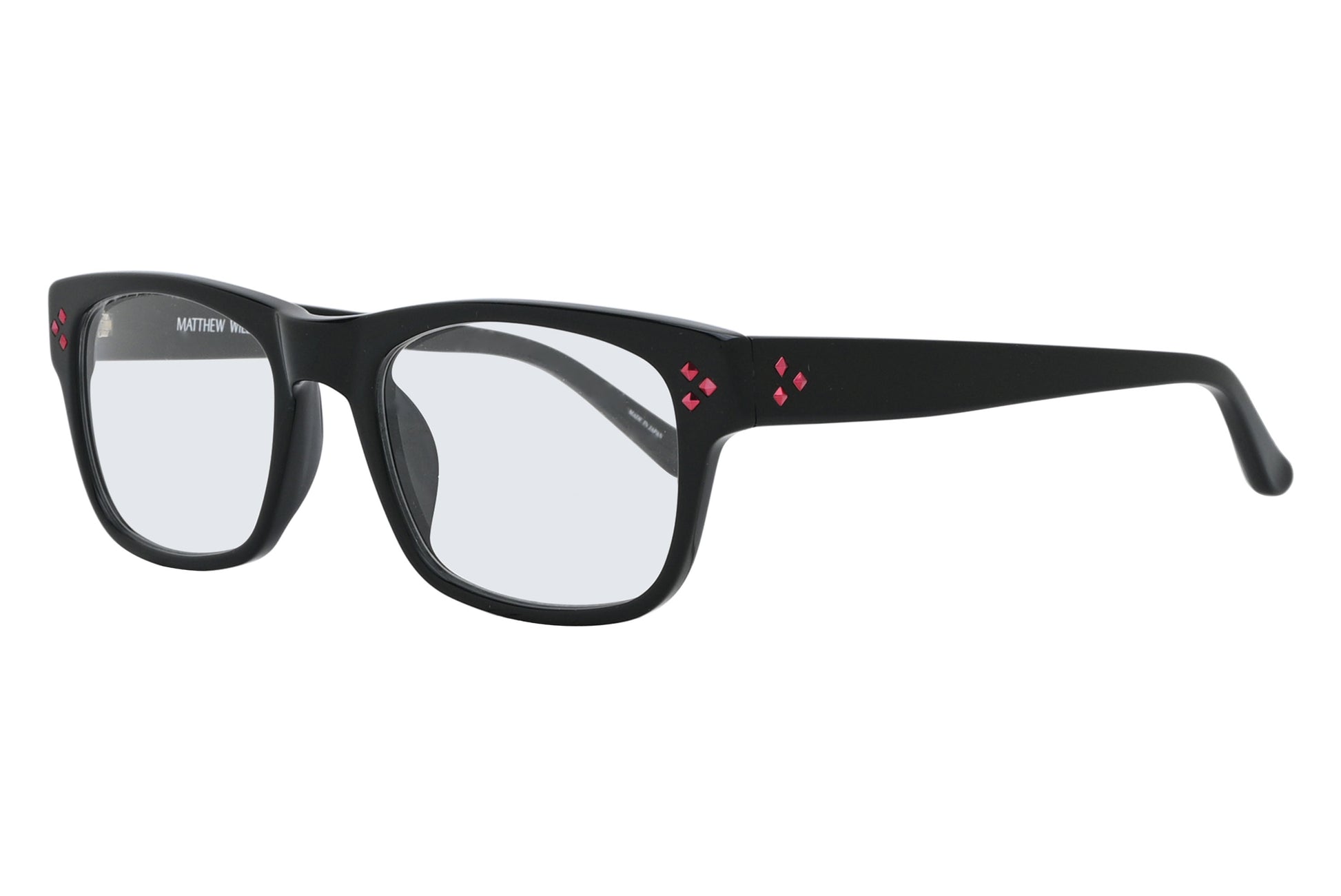 Black eyeglasses with red accents on a white background
