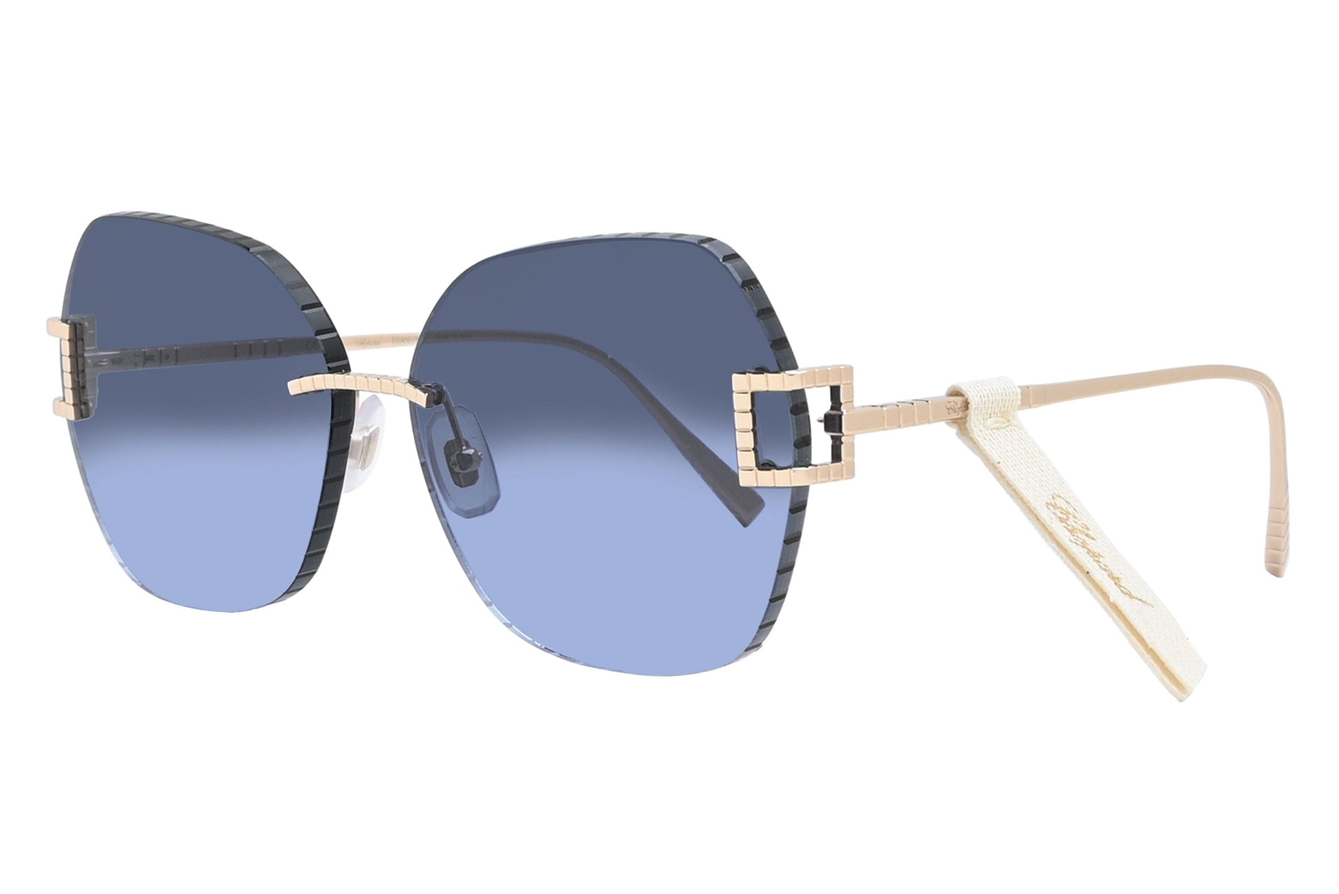 Sunglasses with blue gradient lenses and gold frame on a white background