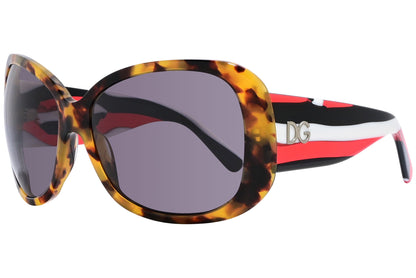 Side view of Dolce & Gabbana tortoise oval sunglasses showing sculpted arms and classic pattern