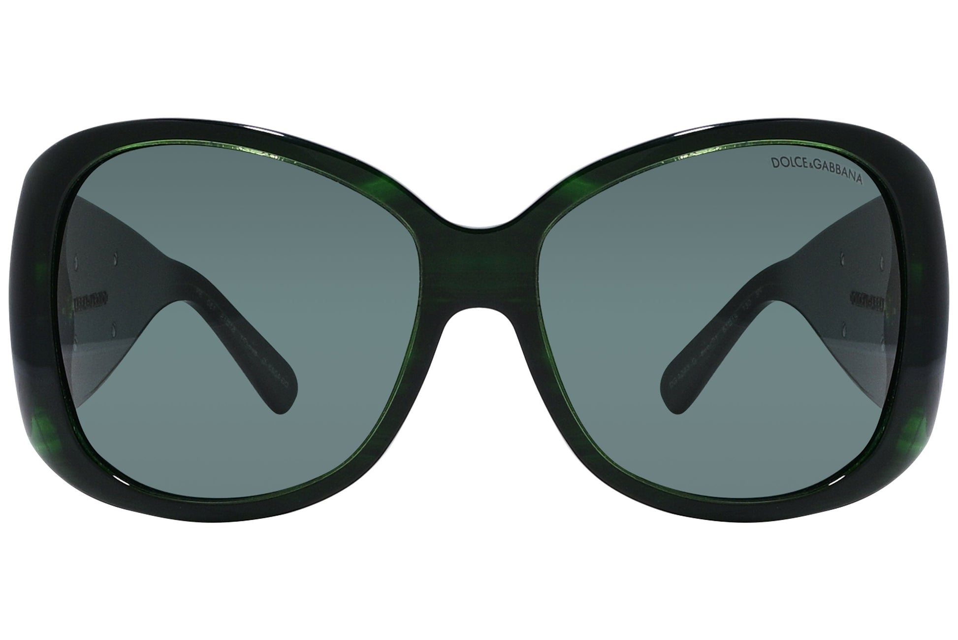 Close-up of Dolce & Gabbana oval sunglasses in green highlighting frame texture and logo detail
