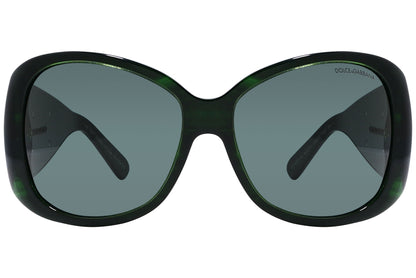 Close-up of Dolce & Gabbana oval sunglasses in green highlighting frame texture and logo detail
