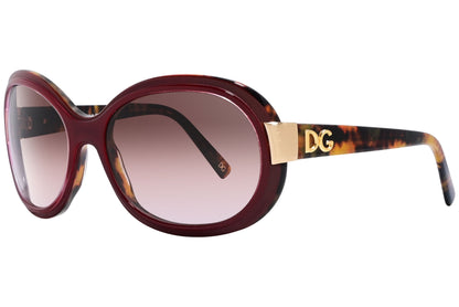 Side view of Dolce & Gabbana red oval sunglasses showing smooth curved frame and sculpted temples