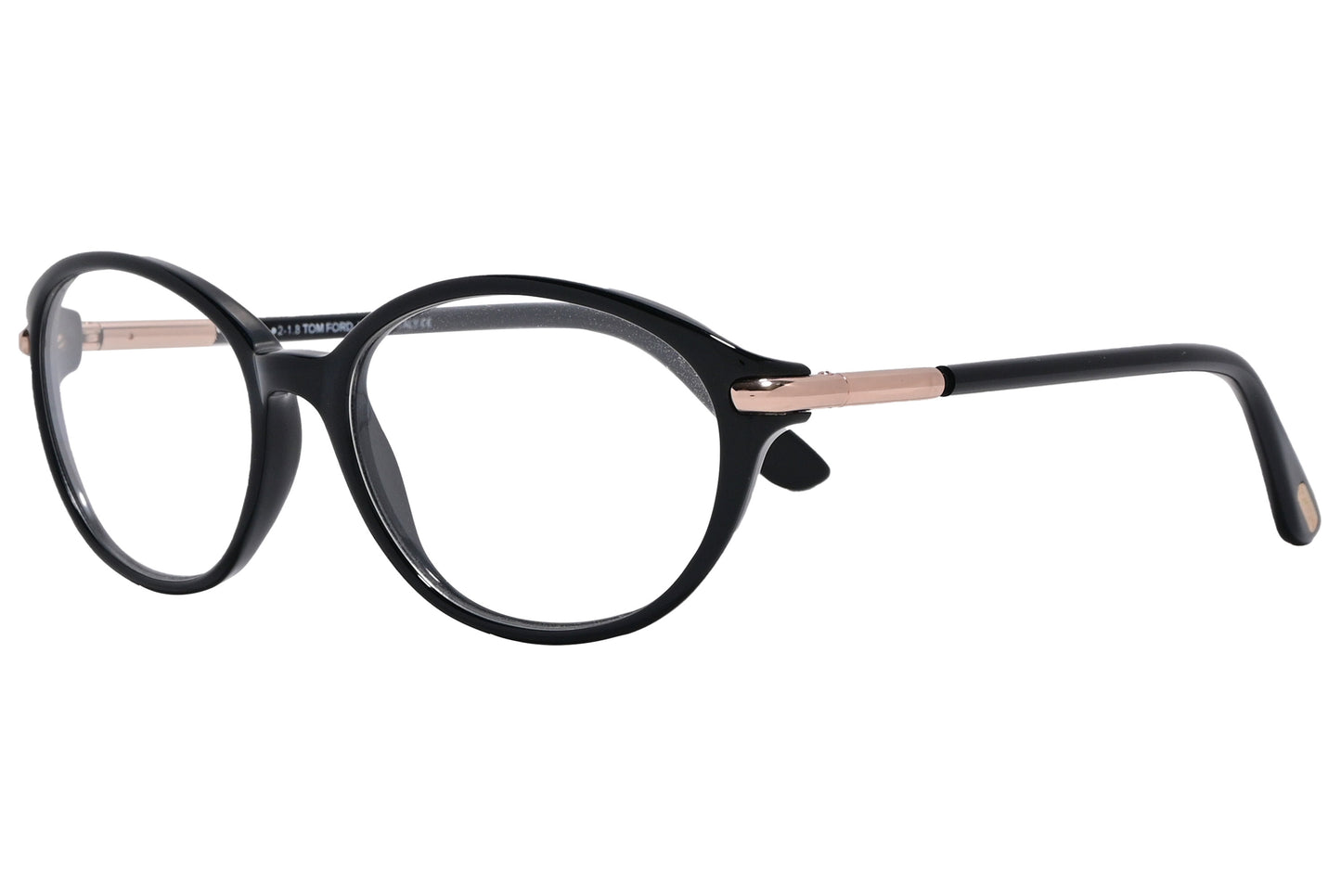 A pair of Tom Ford oval eyeglasses with black frames and gold accents on the arms.