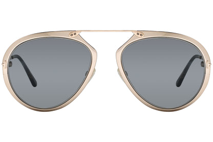A pair of Tom Ford sunglasses with a light gold metal frame and dark lenses.