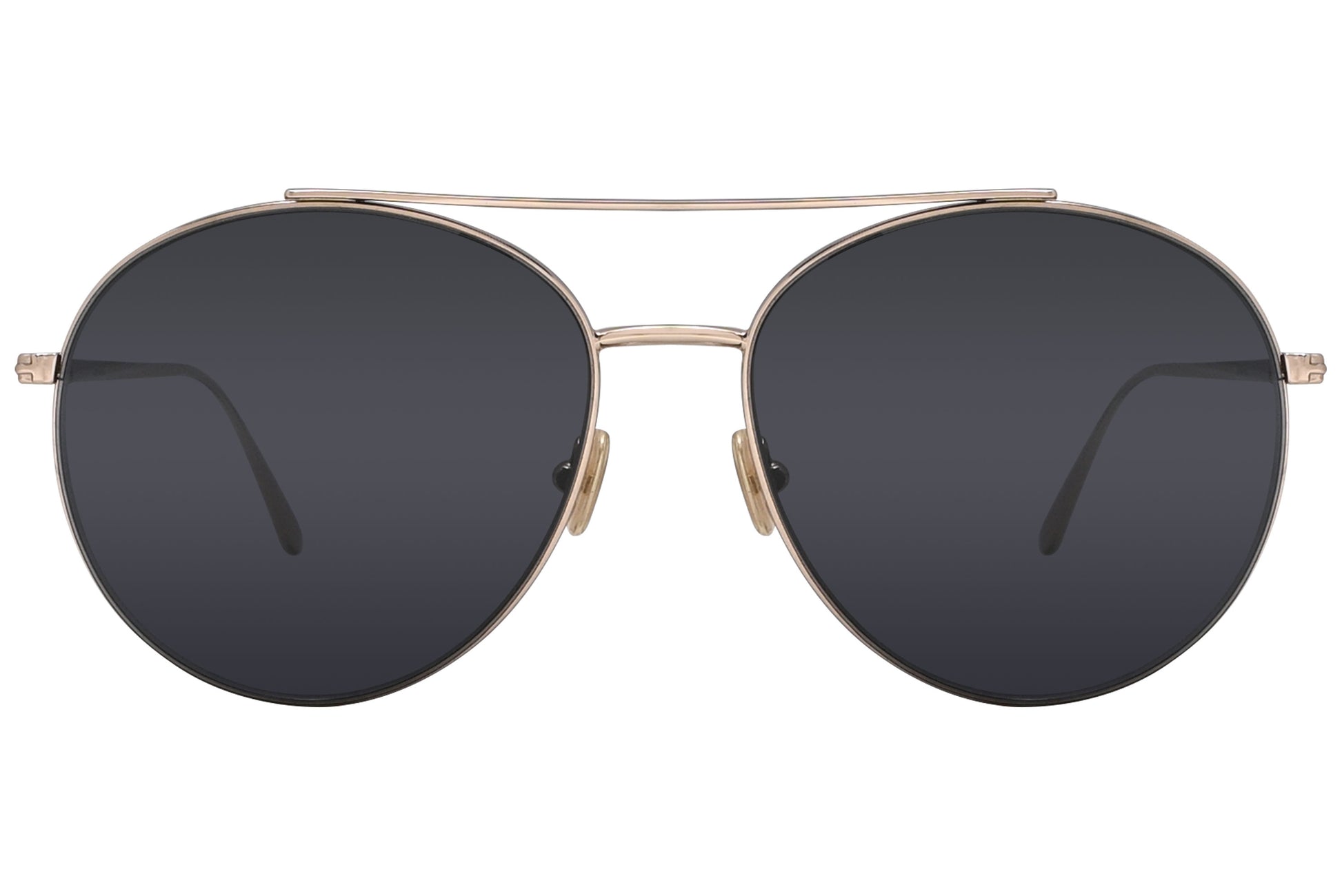 A pair of Tom Ford sunglasses with gold metal frame and dark lenses.
