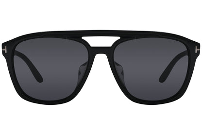 A pair of Tom Ford black aviator sunglasses with dark lenses and a plastic frame.
