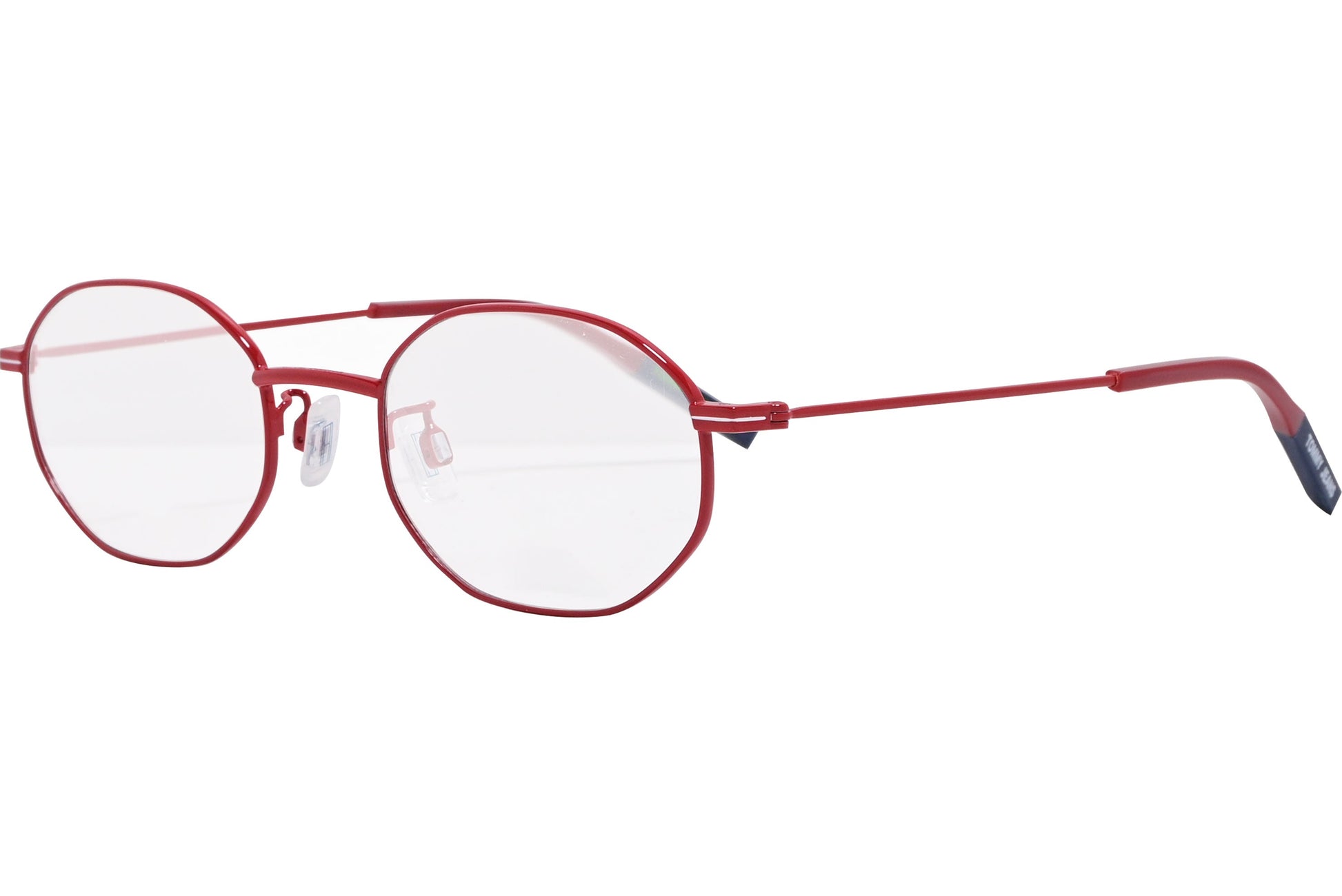 tommy hilfiger hexagonal red eyeglasses frame viewed from a 45-degree angle.